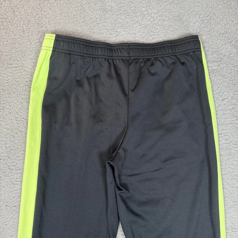 Under Armour Boys YXL Black‎ Neon Yellow Stripe Loose Fit Athletic Track Pants